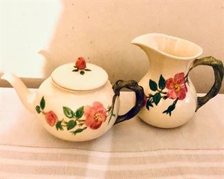$35 each Teapot:  10"L; 6"W; 6"H.  Creamer : 7"L; 5"W; 6.5"H