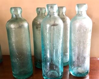 $60 Vintage set of 5 glass blue soda bottles embossed 