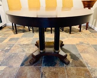$495; Ethan Allen Medallion Mahogany dining table with two leaves; 30" H x 46" diameter. Each extension leaf 18"; Table pads included.