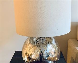 $40; Contemporary table lamp with silver smoke glass base; 21" H x 10" W. Shade is 13" diameter