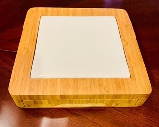 $20; Tile cheese board with knives. Approx 8" x 8"