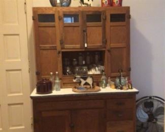 Vintage oak Hoosier cabinet, bean pot, vintage kitchen bottles, mason jars