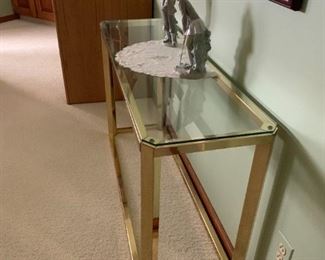 $100 Brass and glass accent table 46w 14d 27h.   Great condition.  