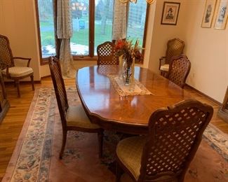 $500 Thomasville trestle style dining table with 6 matching lattice back chairs: 2 arm chairs and 4 side chairs. Chairs have cushions.  Excellent condition.  
.
Table has 2 leaves and full set of protective table pads.  Measurements 72L 45W plus 2 leaves at 20W each. Maximum length 112”. 
.
Buffet cabinet and triple wide storage cabinets also available to coordinate.  