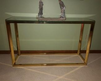 $100 Brass and glass accent table 46w 14d 27h.   Great condition.  