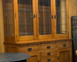 $2500 Mission Arts + Crafts Craftsman China Hutch.  Gorgeous.  Dimensions 66w 19d 84h.   Tiger Oak by Le Meuble Villageois. Hand crafted in Quebec, Canada. Extremely high-quality, on par with Stickley or better. Solid, heavy materials and exceptional craftsmanship. Upper lighted cabinet features glass shelves with plate grooves in wooden frames. The bottom cabinet features many dovetail drawers constructed of solid cedar. 

