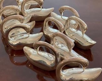 Set of 12 swan napkin holders.