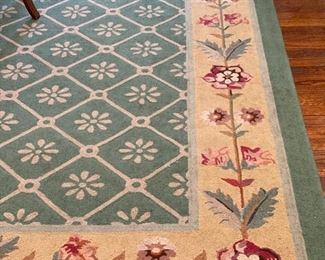 Wool area rug. Measures 9' x 18'.