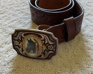 Horse belt buckle and leather belt.