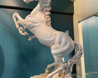 Porcelain white horse.
