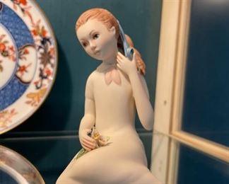 Porcelain figurine.