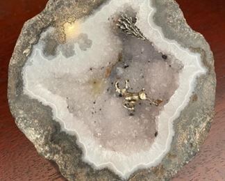 Geode with gold flecks.