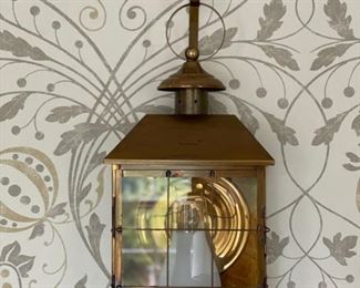 Brass lantern wall sconce. Two available. Each measures 10" H x 6" D x 20" H.