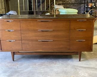 Kent-Coffey The Tableau Low-Boy 9-Drawer Dresser. Walnut veneer. Measures 64” W x 19” D x 31.25” H. Photo 1 of 2.