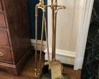 Brass fireplace tool set.
