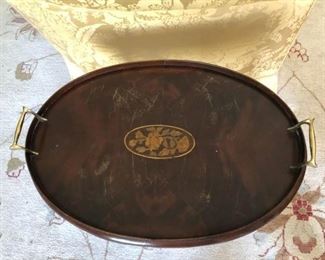 Vintage oval mahogany Butler's Tray Table with floral inlay. Measures 14" W x 5" D x 14" H. Photo 2 of 2.