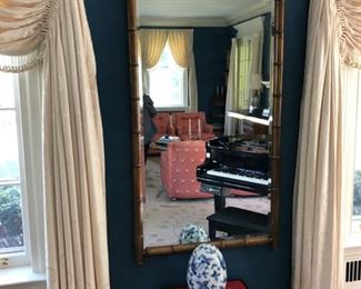 Faux Bamboo Mirror. Measures 62" H x 30" W.