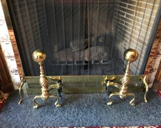 Pair of Early American Cannonball Brass Andirons with Claw Feet.