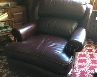 Leathercraft oxblood club chair with nailhead trim on arms - 2 available. Each measures 33" H x 33" W x 17" H.