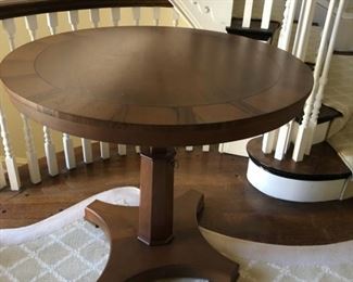 36" round adjustable-height entry/occasional table.