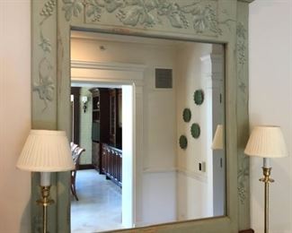 Hand-stenciled wall mirror with matching chest.