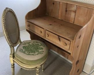 Vintage pine desk and antique chair with needlepoint cushion.