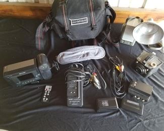 https://ctbids.com/#!/description/share/687771 Sharp Viewcam 8 Video Camera and More. Sharp 8mm Handycam with cords and miscellaneous accessories. 2 vintage cameras, Brownie and Anscoflex II.