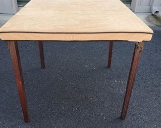https://ctbids.com/#!/description/share/687773 Beautiful vintage wooden folding table with corduroy dust cover. 30x30x27"