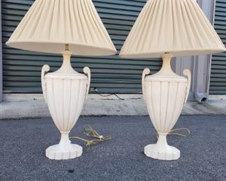 https://ctbids.com/#!/description/share/687782 Two beautiful cream colored heavy lamps. They are each 36" tall. The base is 11" x 6". And the shades are 24" x 13".