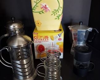 https://ctbids.com/#!/description/share/687784 Breakfast is ready to go. Includes 2 French press coffee pots, stovetop espresso pot, 2 glass coffee pots, citrus express juicer, yellow butterfly cookie jar 11x7", perfect for biscotti, and a travel espresso pot.