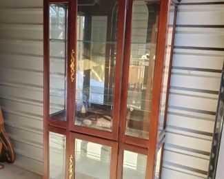 https://ctbids.com/#!/description/share/687792 Lighted curio cabinet in cherry finish. Has 3 adjustable glass shelves with plate routing. Measurements: 36x13x78" Shelves 12x34"