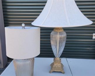 https://ctbids.com/#!/description/share/687808 The shorter lamp is 20" tall. The shade has a slight sparkle to it. The taller lamp is 33" tall. The base has a crackle finish and the glass portion has a speckled white white finish.