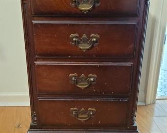 https://ctbids.com/#!/description/share/687820 Four drawer Kling genuine mahogany side table. Measures 28" tall. 18" across and 13" from the wall. Each drawer is 11x10 and 3" deep.