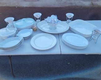 https://ctbids.com/#!/description/share/687840 Any kitchen could use these serving dishes! They are white so they can be used year round!! The square covered dish is 7x7 and 3" deep. The rectangle covered dish is 11x8 and 3" deep. The 4 oval dinner plates are 11x9. The 5 oval baking dishes are 10x6. The 4 round baking dishes are 7" across. The flower bowl is 5" tall. The large rectangle serving platter is 14x11 and 2" deep. The large oval serving platter is 18x13. The candle burners are 6" tall.