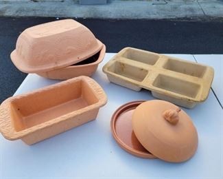 https://ctbids.com/#!/description/share/687844 Terracotta Cookware. These pieces are incredible! The bread dish is 9x5. The four loaf pan is 16x10, each loaf is 6x3. The garlic bake is 7" across. The turkey baker is 11x8 and 4" deep.