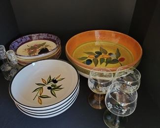 https://ctbids.com/#!/description/share/687851 Everything you need to serve up pasta and salad family style. Includes 2 oversized bowls 13", 4 salad bowls with olives 9", 4 Certified International bowls decorated with olives, eggplant, artichoke and tomatoes 9, 2 oil and vinegar jars 7" and 3 drinking glasses with grape etching. 6".