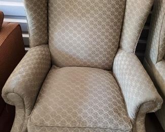 https://ctbids.com/#!/description/share/687795 Nice upholstered wingback chair by Rowe Furniture. Queen Anne style legs, green and beige design. Some discoloration on seat cushion. Pet friendly home. Measurements: 34x35x43" Cushion height 20" Depth 22". Matching chair is in lot Z106.