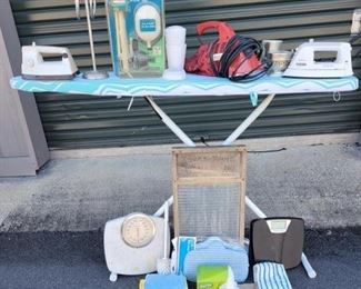 https://ctbids.com/#!/description/share/687813 Various bathroom sets and cleaning items are included. A hand-held vacuum and 2 irons. The ironing board has some tape on the lever to close it, but still works and a vintage washboard.