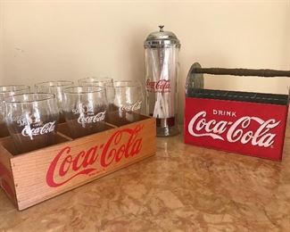 $50 Lot of three Coca-Cola collectibles.  (Metal tote has fading on one side -- as is)