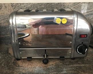 $100 Dualit 4-slice toaster.  Works well.  