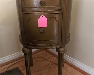 $85 Gold finish rounded front small side table.  28"x14"x16"