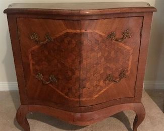 $300  Old French marquetry bow front cabinet.  Some wear.  31"x35"x20"