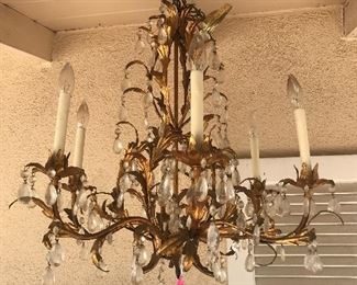 $125  Gilt metal chandelier with crystal drops.  Height 24" x Width 24" 