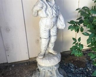 $150  Concrete figural outdoor statue of boy with fish.  Height 30"