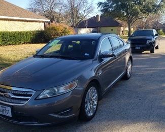 A 2011 Ford Taurus Limited, 94k, $7000