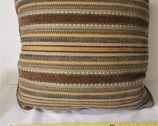 One Multi Colored Decorative Pillow. In Good Condition.