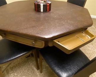 Card table with vinyl top; swivel out drawers, and 4 chairs; $100