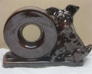 Ceramic Scottie dog figure with a ring