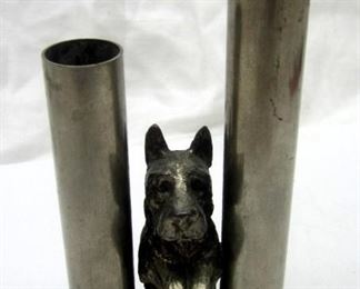 A vintage metal Scottie dog bud vase with figure of dog between two pole form vases.  5" tall.  Purchased 1995 at Myken's in Issaqua WA for $52.50 
