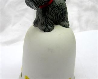 Porcelain bell with flower pattern and Scottie dog figure handle.  5.25" tall.  Unsigned
